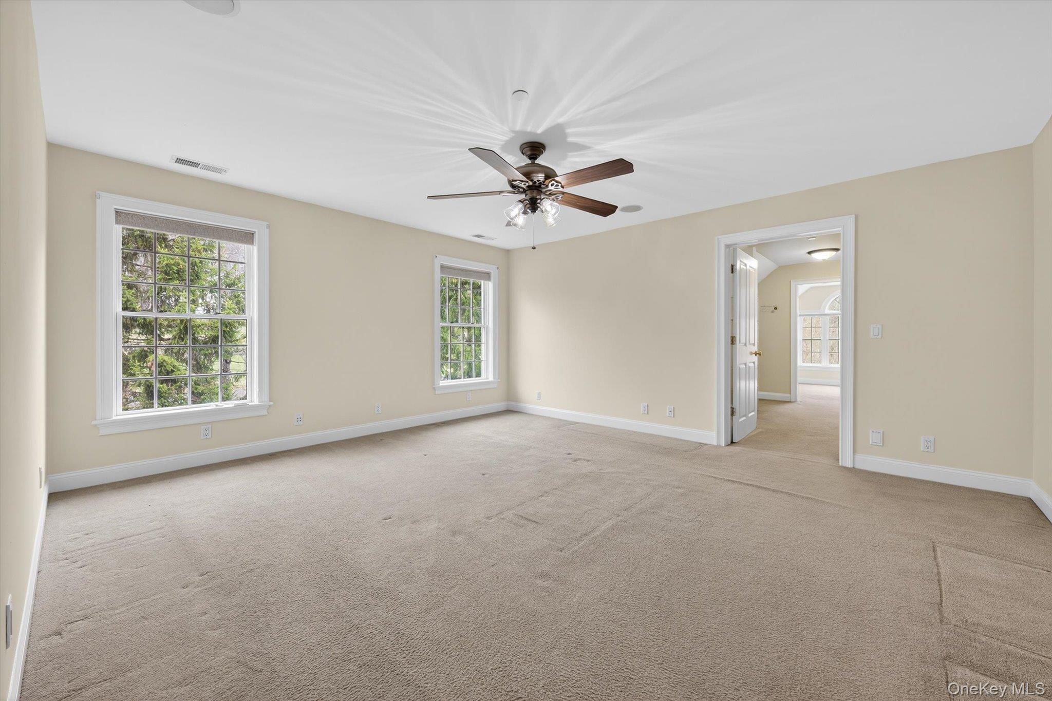 7 Farm Hollow Road New Windsor, NY 12553 - Photo 19 of 36 Spare room with light carpet and ceiling fan
