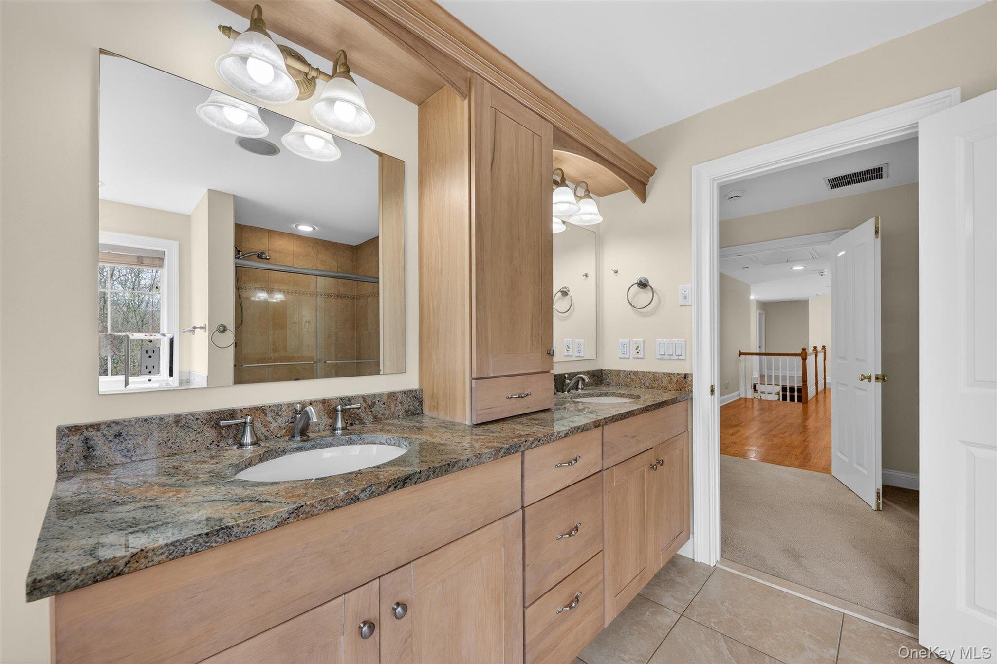 7 Farm Hollow Road New Windsor, NY 12553 - Photo 23 of 36 Bathroom featuring double vanity, light colored carpet, a stall shower, and light tile patterned floors
