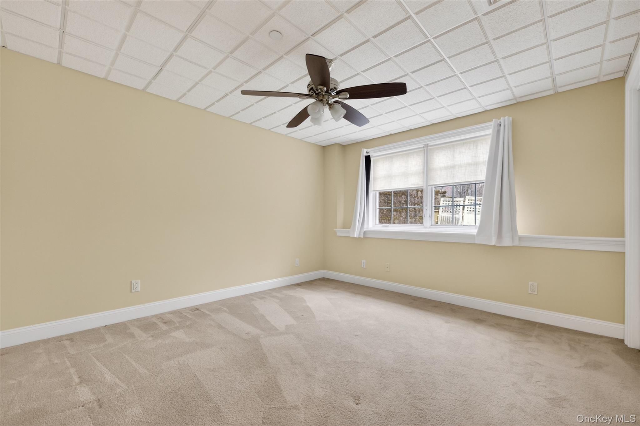 7 Farm Hollow Road New Windsor, NY 12553 - Photo 27 of 36 Spare room with a drop ceiling, light carpet, and ceiling fan