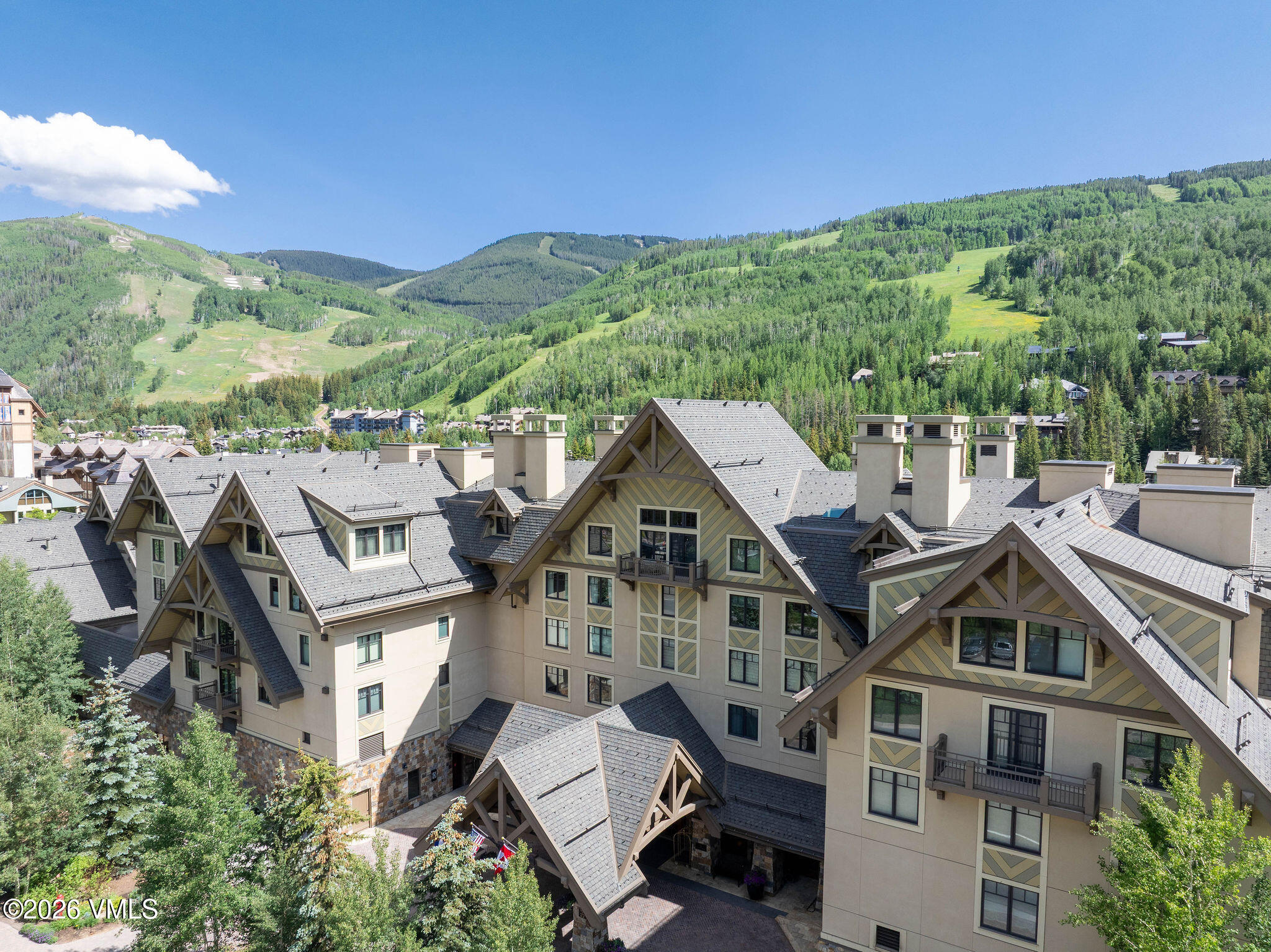 1 Vail Road, Unit 5102J Vail, CO 81657 - Photo 16 of 26 an aerial view of residential houses with outdoor space and trees