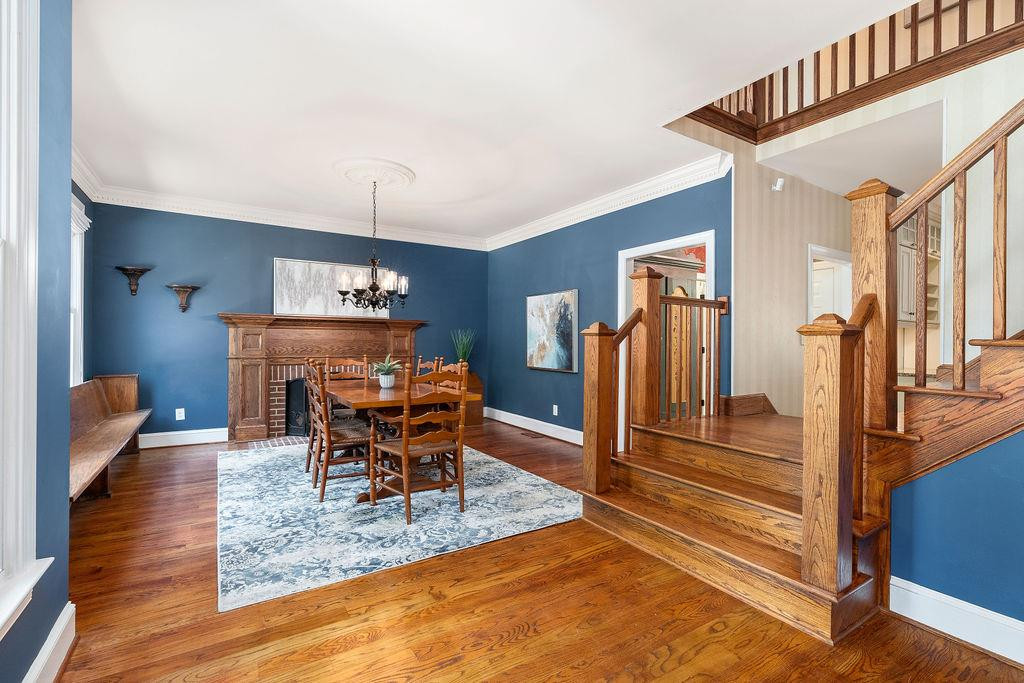 4901 Salem Ridge Road Holly Springs, NC 27540 - Photo 5 of 30 Formal Dining Room with Wood Burning Fireplace for an Elegant Dining Experience