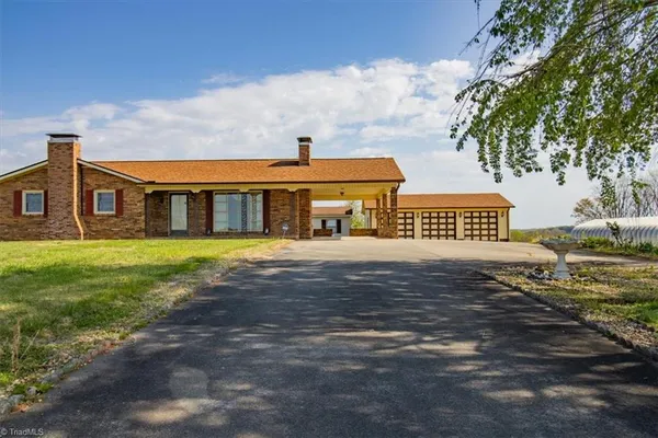 $895,000 | 3556 White Plains Road, Roaring River, NC 28669