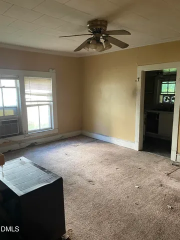 a kitchen with a stove and a microwave