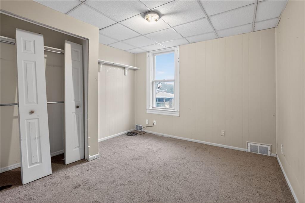 1212 Woodward Avenue McKees Rocks, PA 15136 - Photo 19 of 34 a view of an empty room with a window