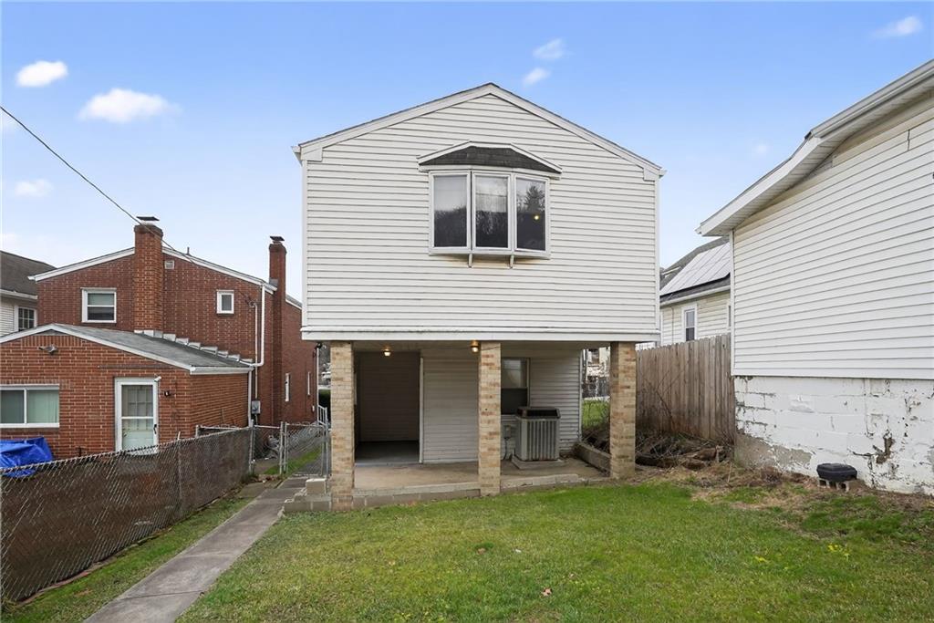 1212 Woodward Avenue McKees Rocks, PA 15136 - Photo 30 of 34 a front view of a house with a yard