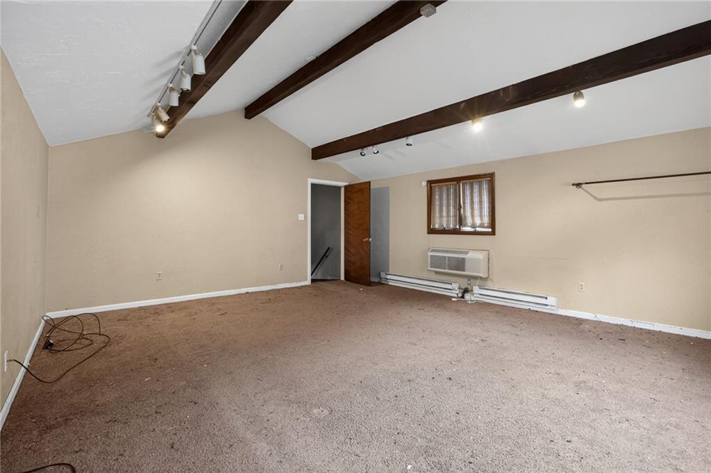 1212 Woodward Avenue McKees Rocks, PA 15136 - Photo 4 of 34 an empty room with windows