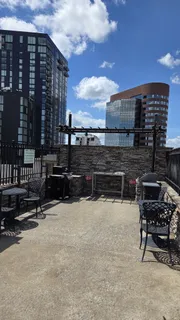 a view of a terrace with chairs