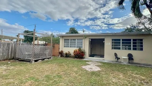 a front view of a house having yard
