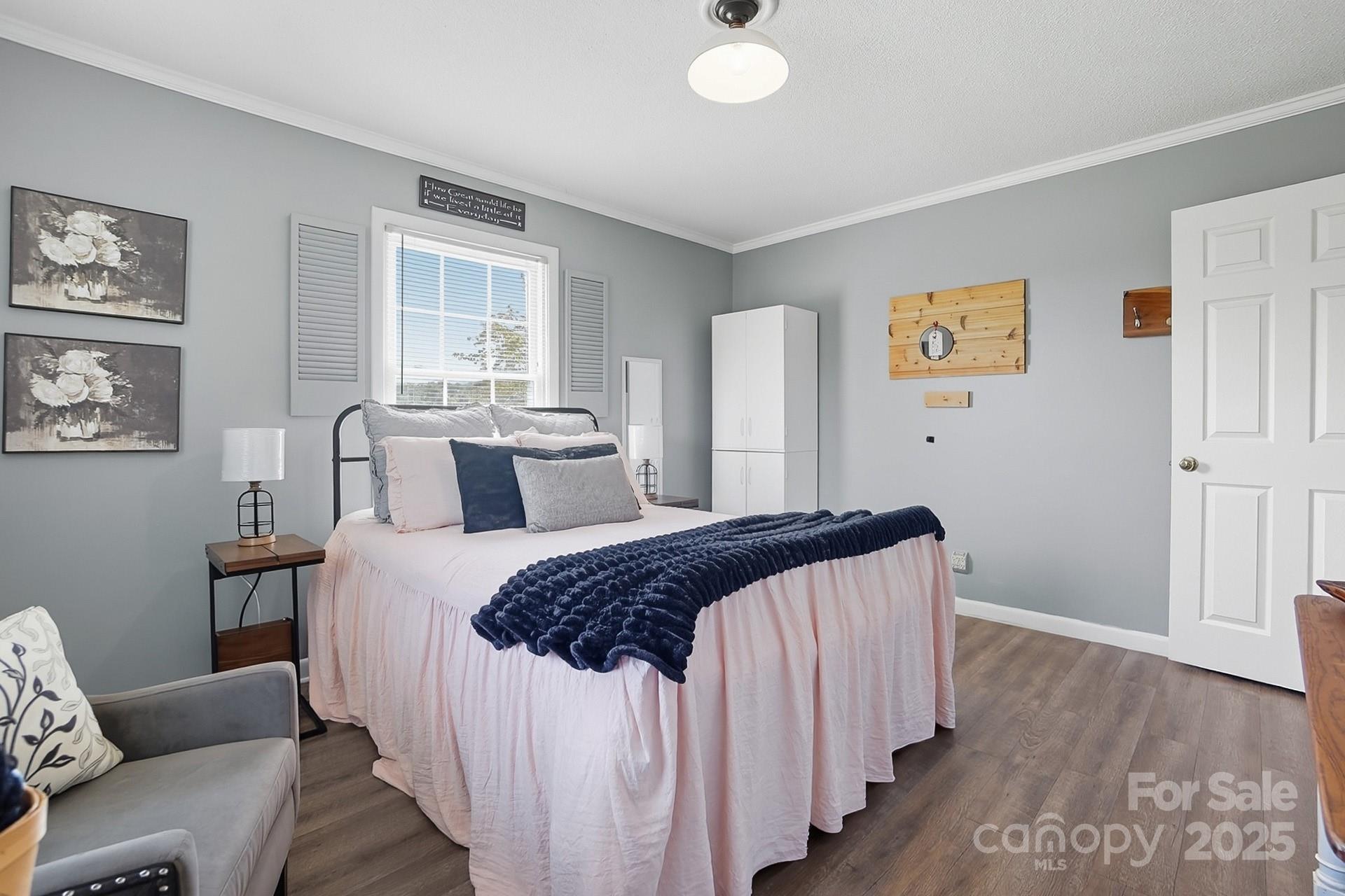 201 Airport Road Monroe, NC 28110 - Photo 21 of 47 a bedroom with bed and a window