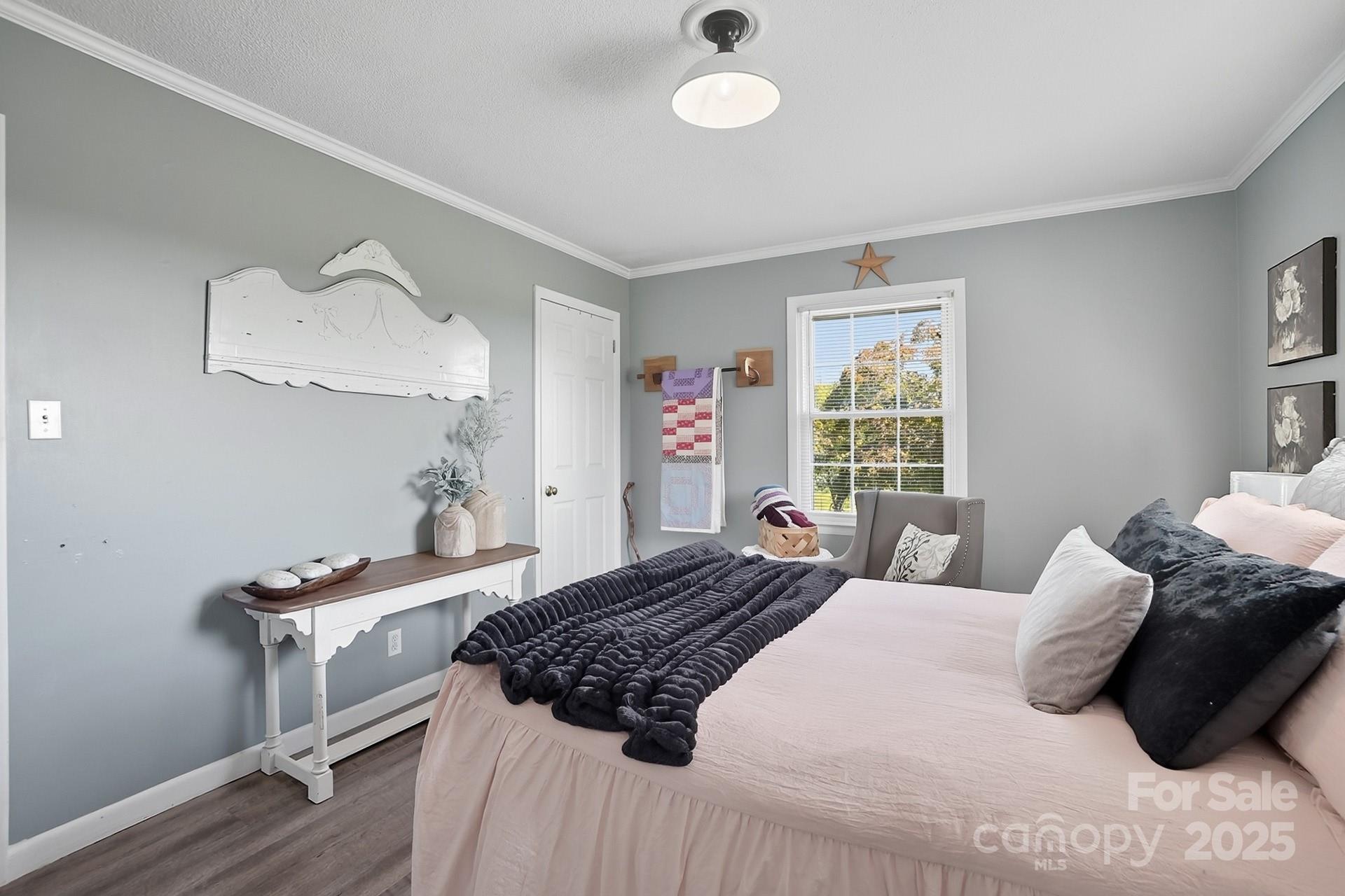 201 Airport Road Monroe, NC 28110 - Photo 23 of 47 a bedroom with a bed and a window
