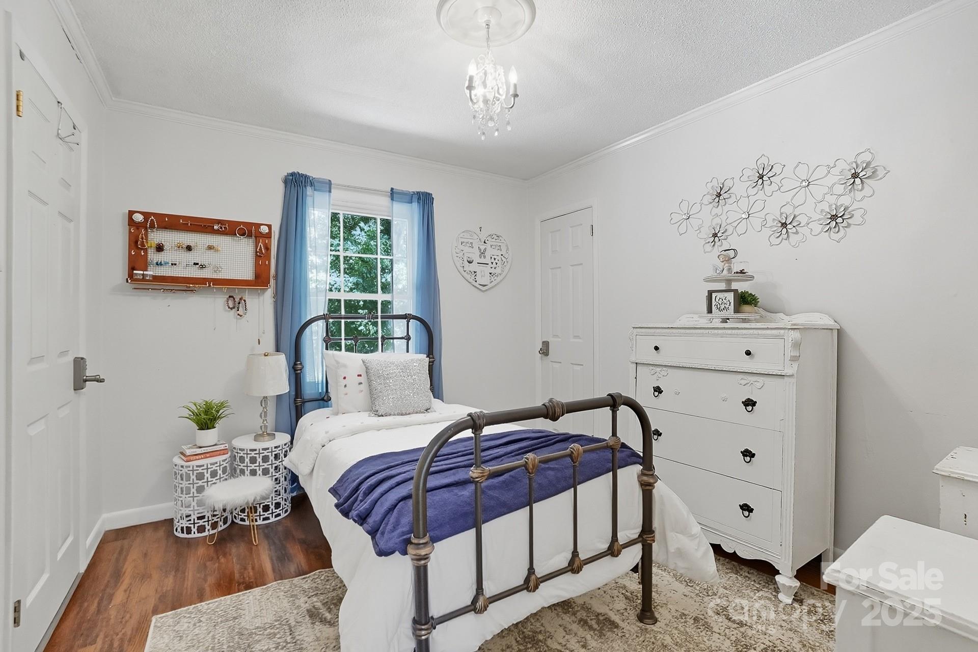 201 Airport Road Monroe, NC 28110 - Photo 29 of 47 a bedroom with a bed and a window