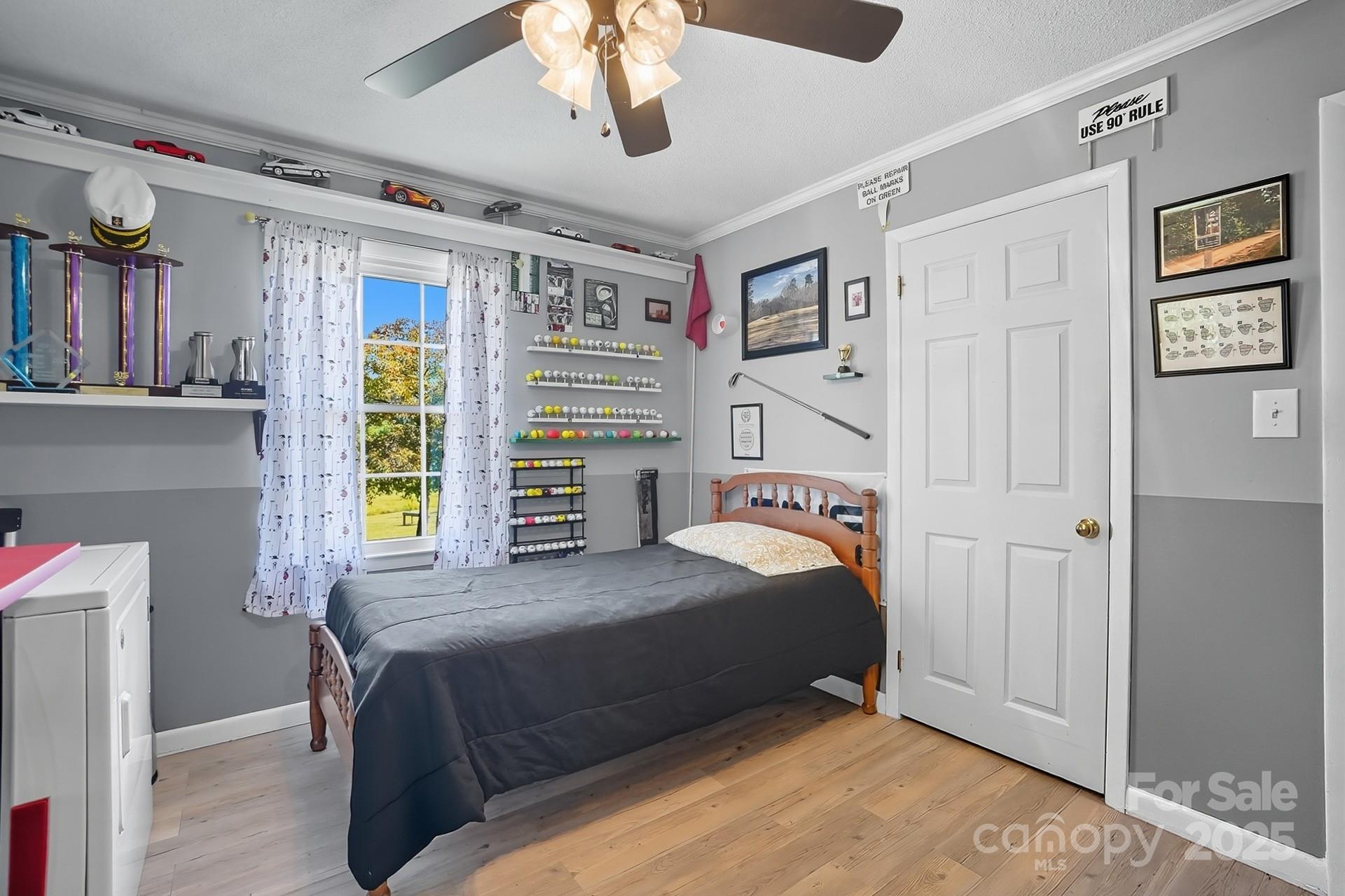201 Airport Road Monroe, NC 28110 - Photo 30 of 47 a bedroom with a bed and a window