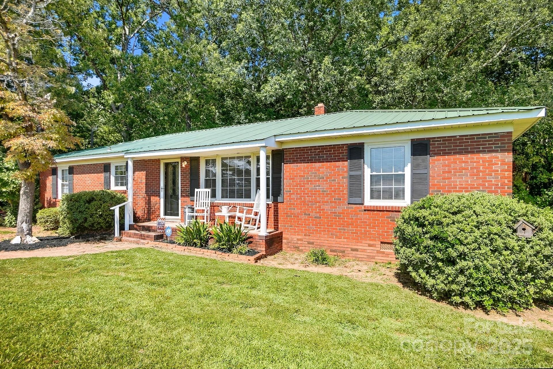 201 Airport Road Monroe, NC 28110 - Photo 3 of 47 front view of house with a yard
