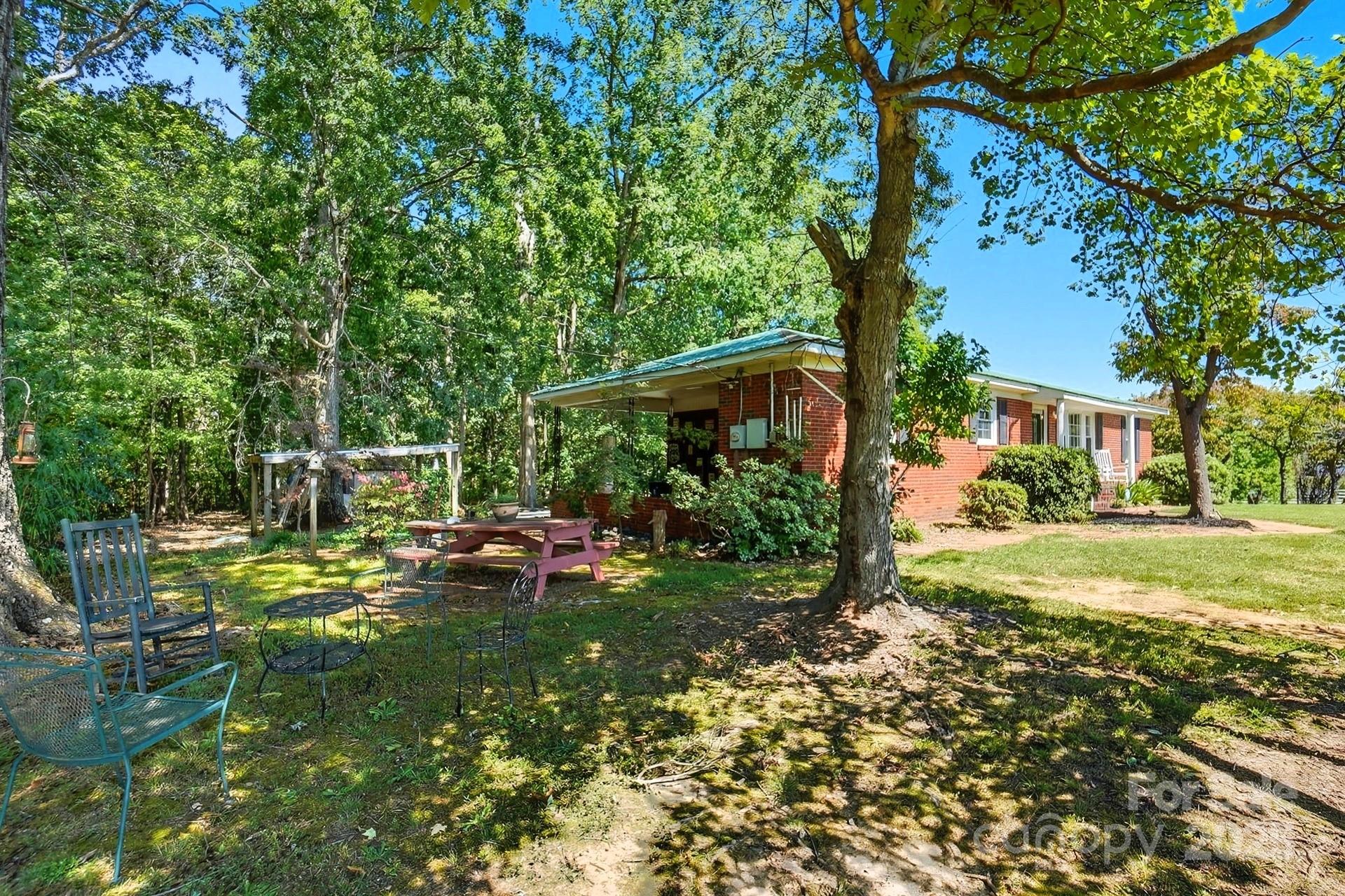 201 Airport Road Monroe, NC 28110 - Photo 38 of 47 front view of a house with a yard