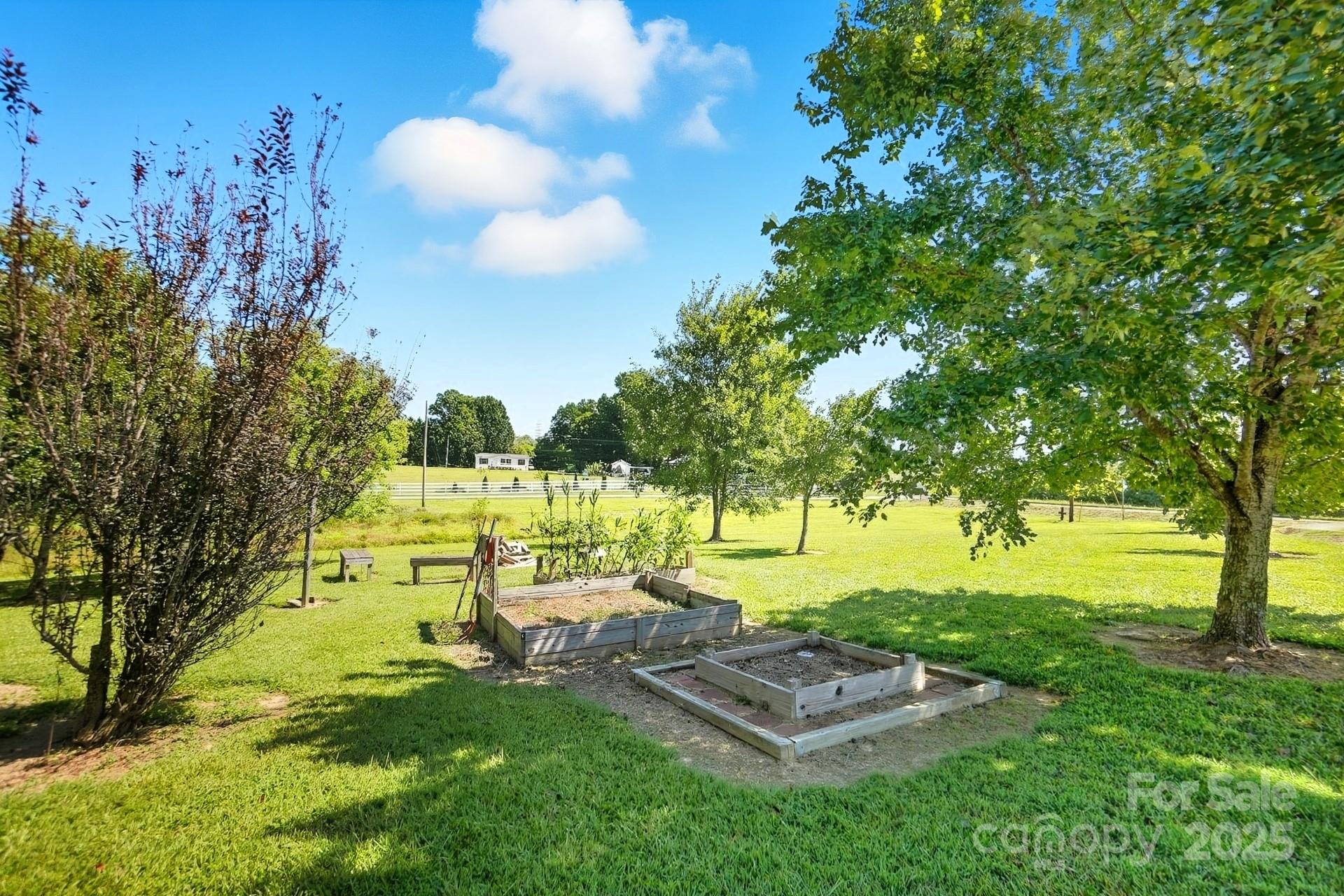 201 Airport Road Monroe, NC 28110 - Photo 40 of 47 a view of a park with large trees