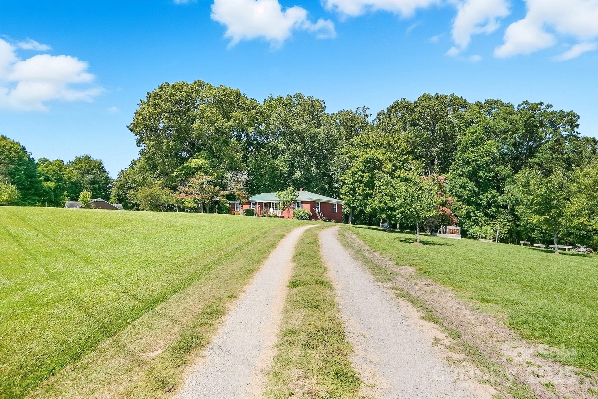 201 Airport Road Monroe, NC 28110 - Photo 42 of 47 a view of a park with large trees