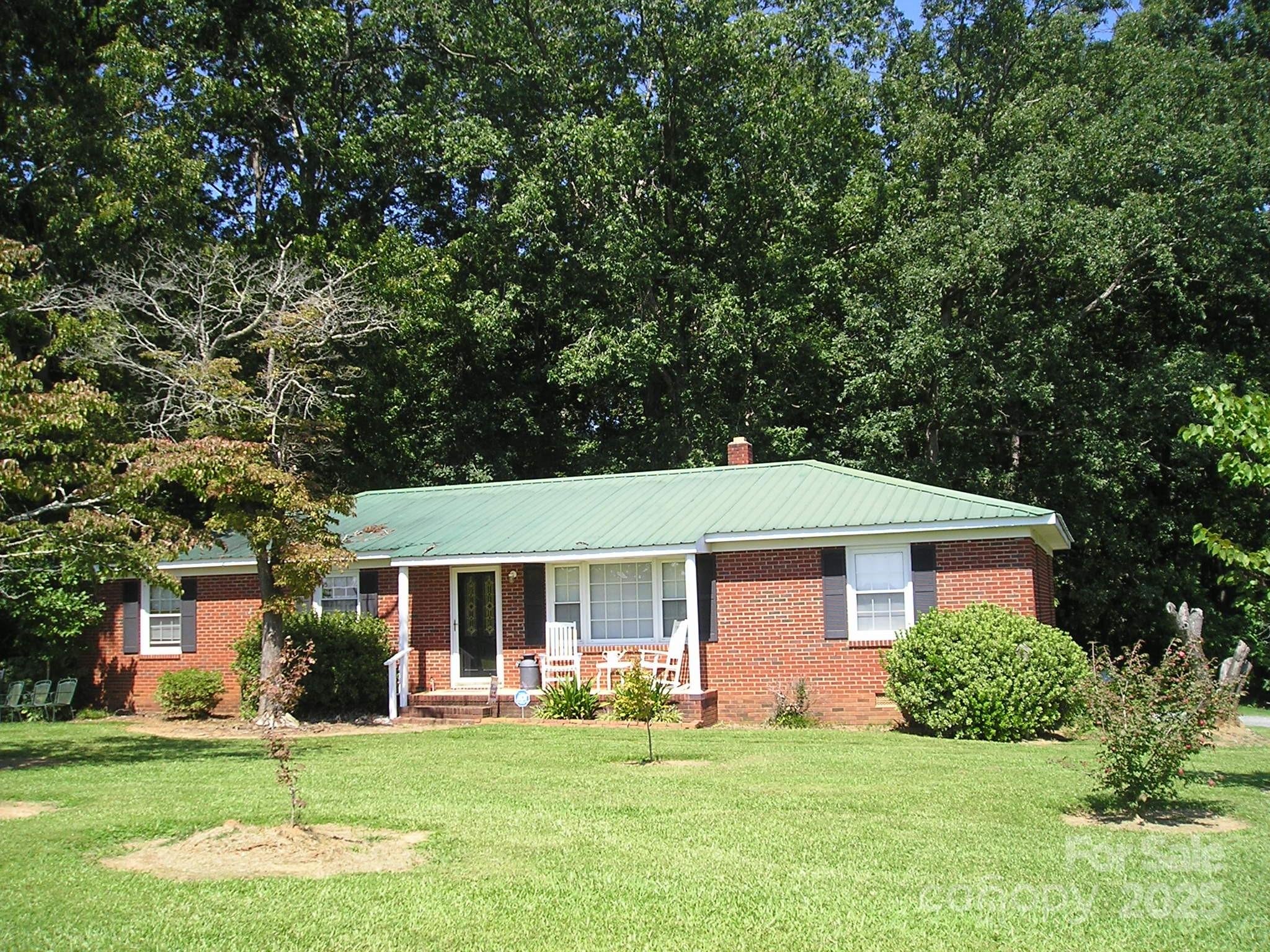 201 Airport Road Monroe, NC 28110 - Photo 45 of 47 front view of a house and a yard