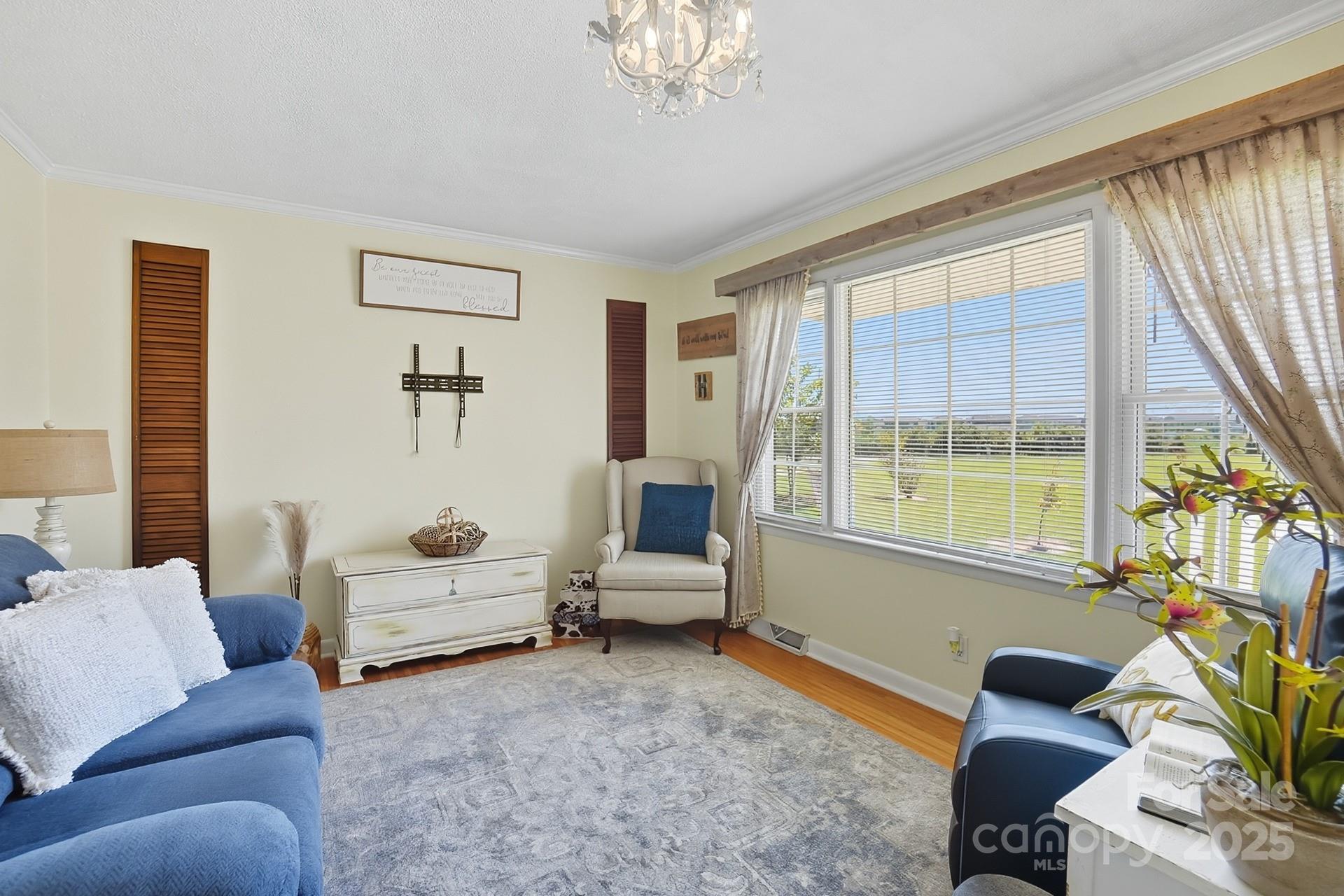 201 Airport Road Monroe, NC 28110 - Photo 7 of 47 a living room with furniture and a large window
