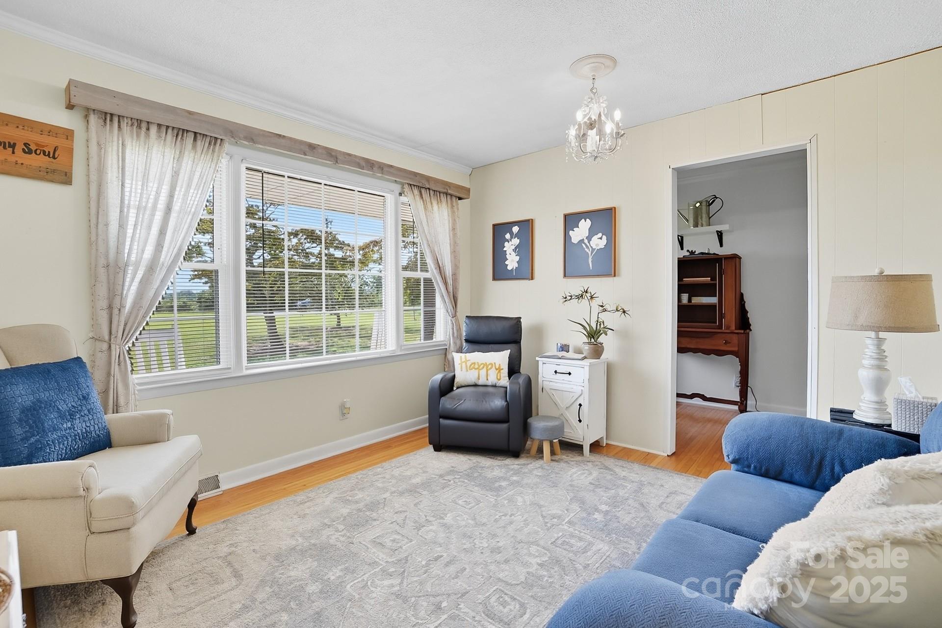 201 Airport Road Monroe, NC 28110 - Photo 9 of 47 a bedroom with furniture and a large window