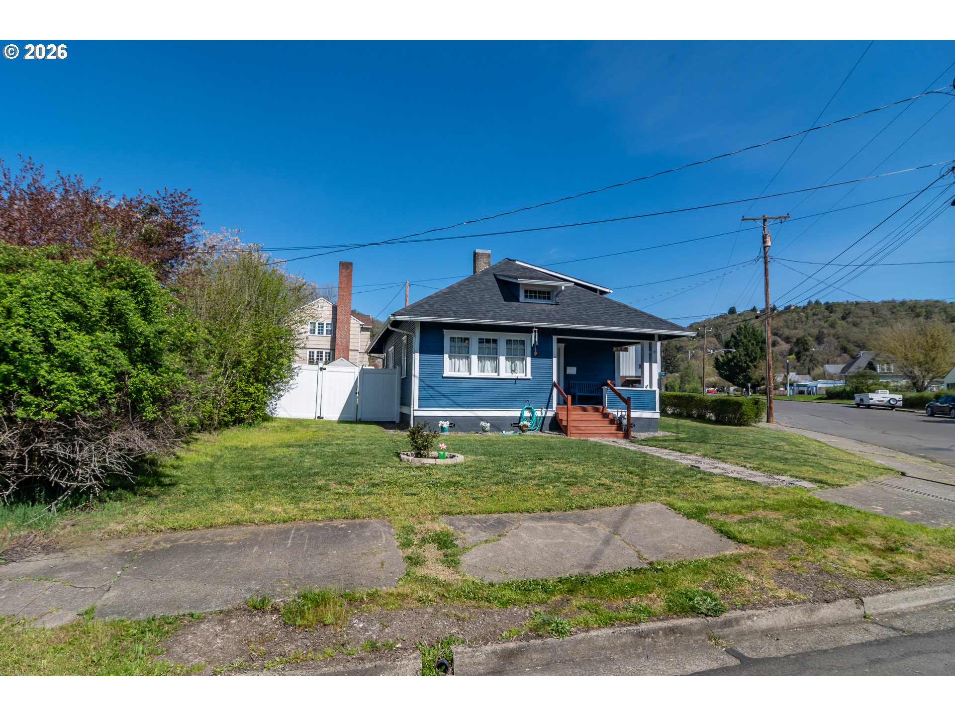 334 Northeast Nash Street Roseburg, OR 97470 - Photo 32 of 32 a front view of a house with a yard