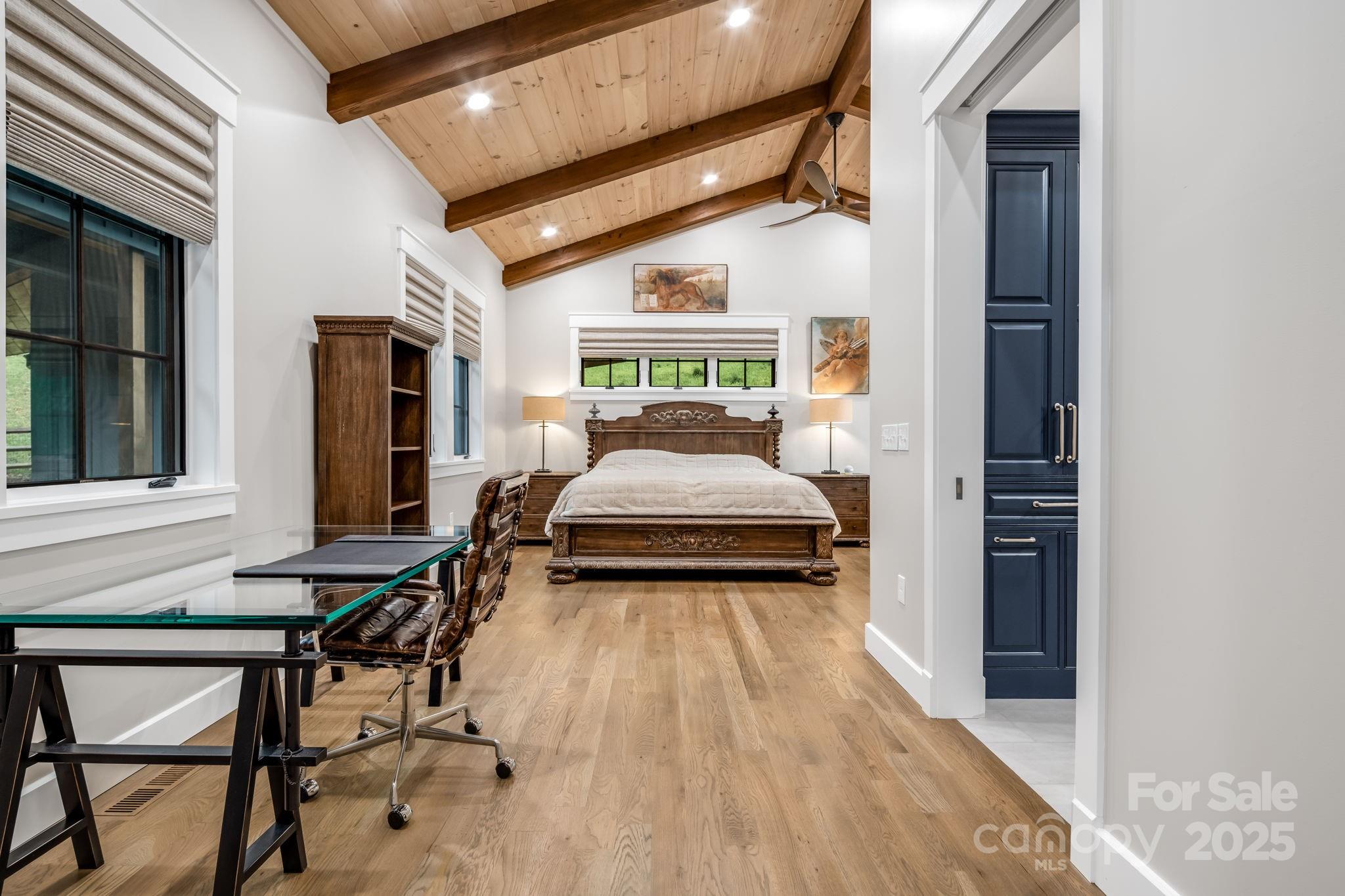 1416 East Clubhouse Road, Unit 73 Sylva, NC 28779 - Photo 19 of 48 a bedroom with a bed and a large window