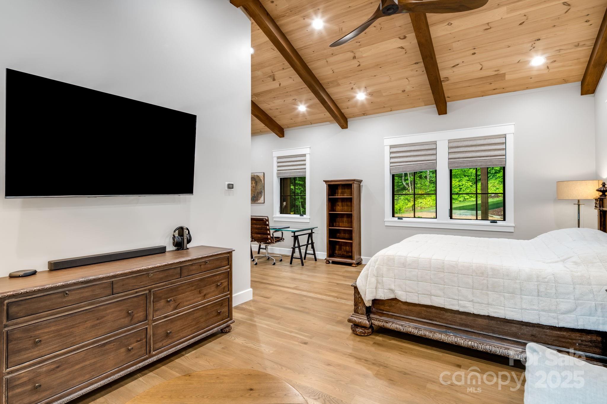 1416 East Clubhouse Road, Unit 73 Sylva, NC 28779 - Photo 20 of 48 a bedroom with bed and flat screen tv