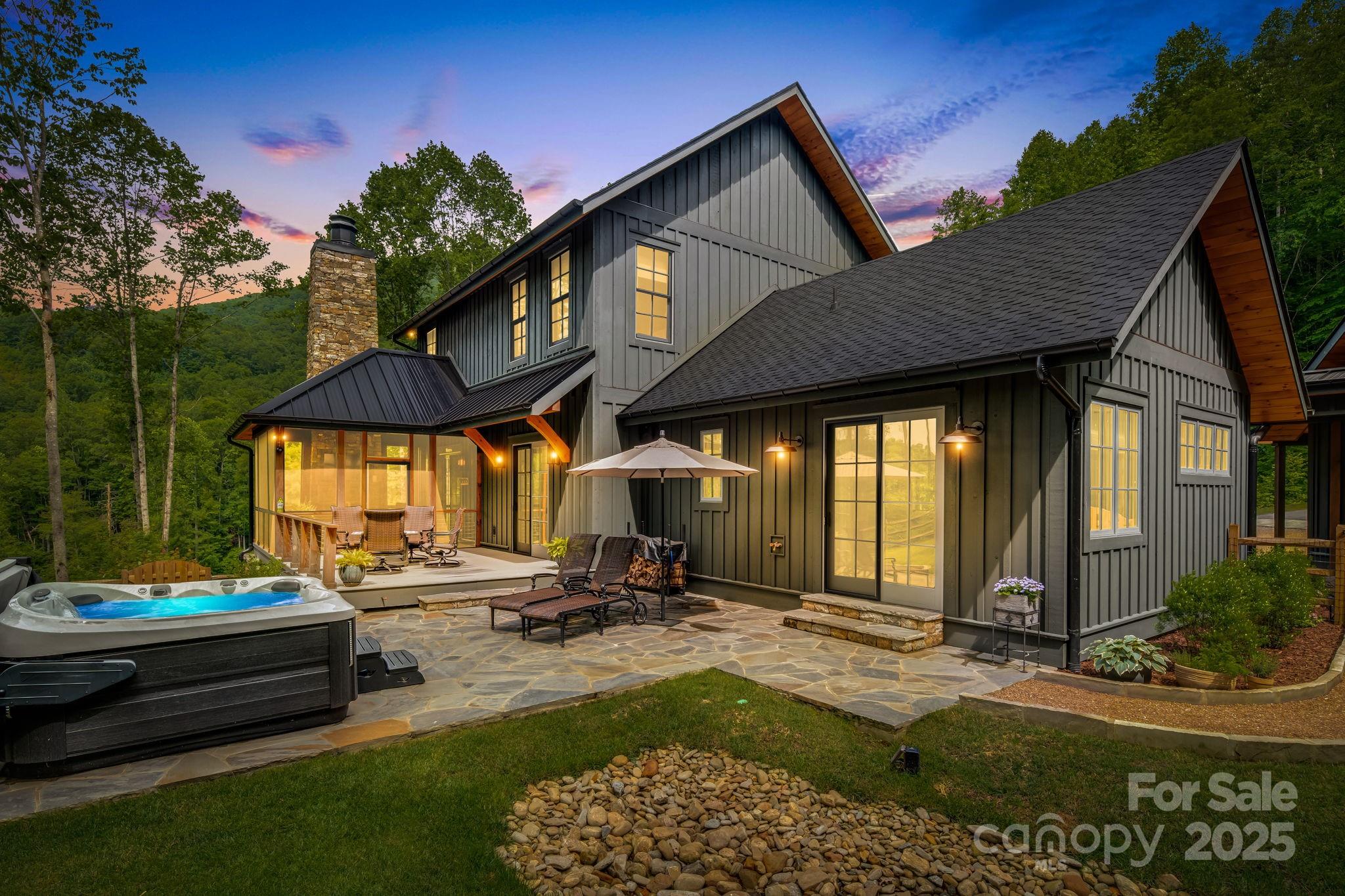 1416 East Clubhouse Road, Unit 73 Sylva, NC 28779 - Photo 3 of 48 a front view of a house with garden