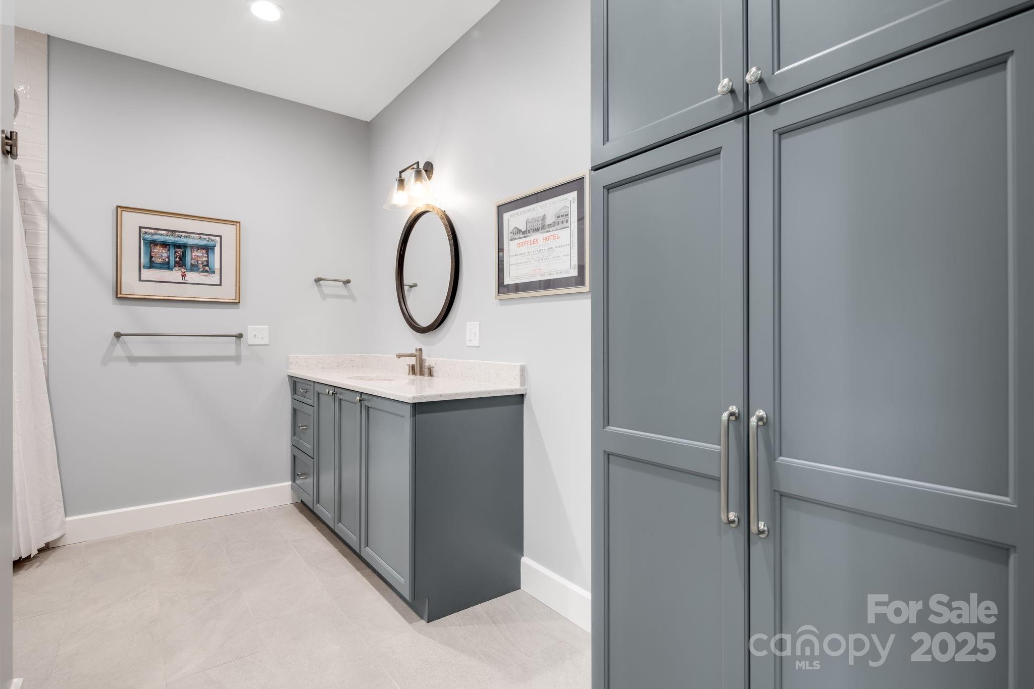 1416 East Clubhouse Road, Unit 73 Sylva, NC 28779 - Photo 32 of 48 a bathroom with a sink and a mirror