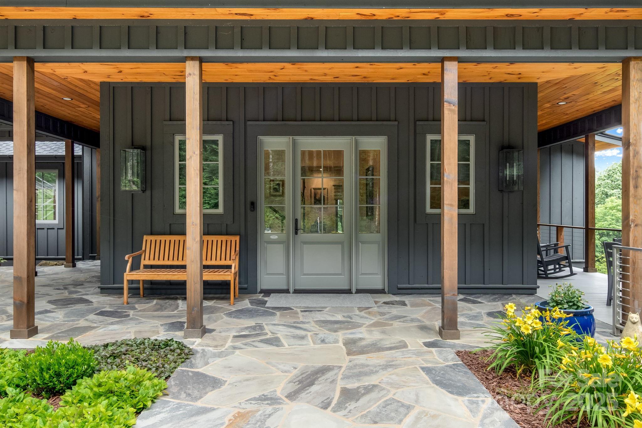 1416 East Clubhouse Road, Unit 73 Sylva, NC 28779 - Photo 6 of 48 a front view of a house with a porch