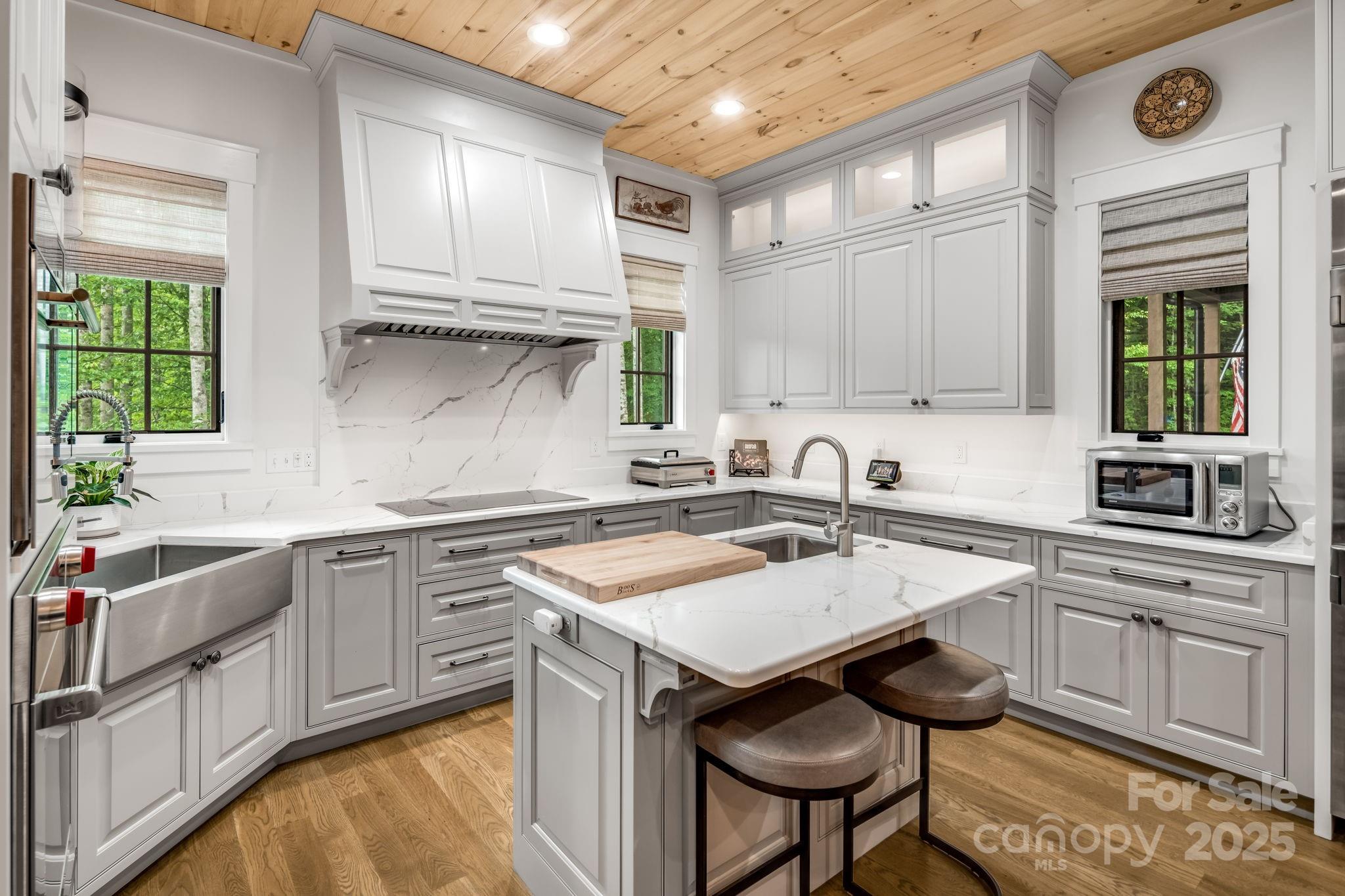 1416 East Clubhouse Road, Unit 73 Sylva, NC 28779 - Photo 10 of 48 a kitchen with a sink cabinets and window