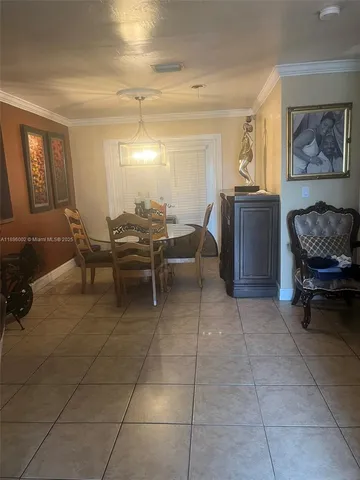 a outdoor space with lots of chairs and mirrors