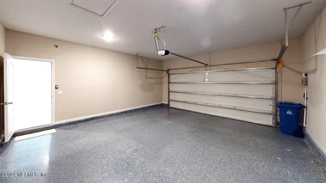 a view of an empty room with a bathroom