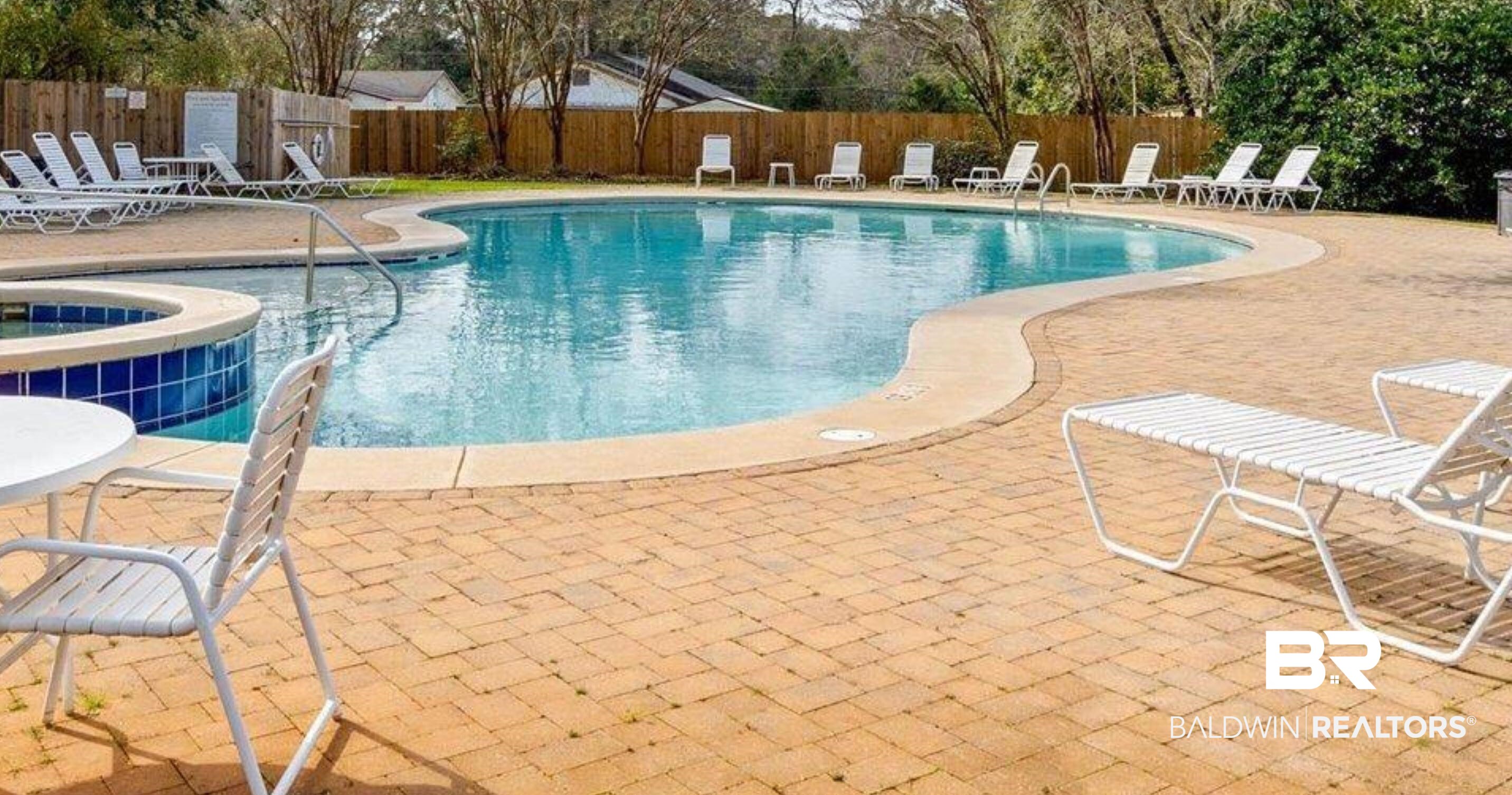 25806 Pollard Road, Unit 203 Daphne, AL 36526 - Photo 13 of 14 View of swimming pool featuring a patio area and a pool with connected hot tub