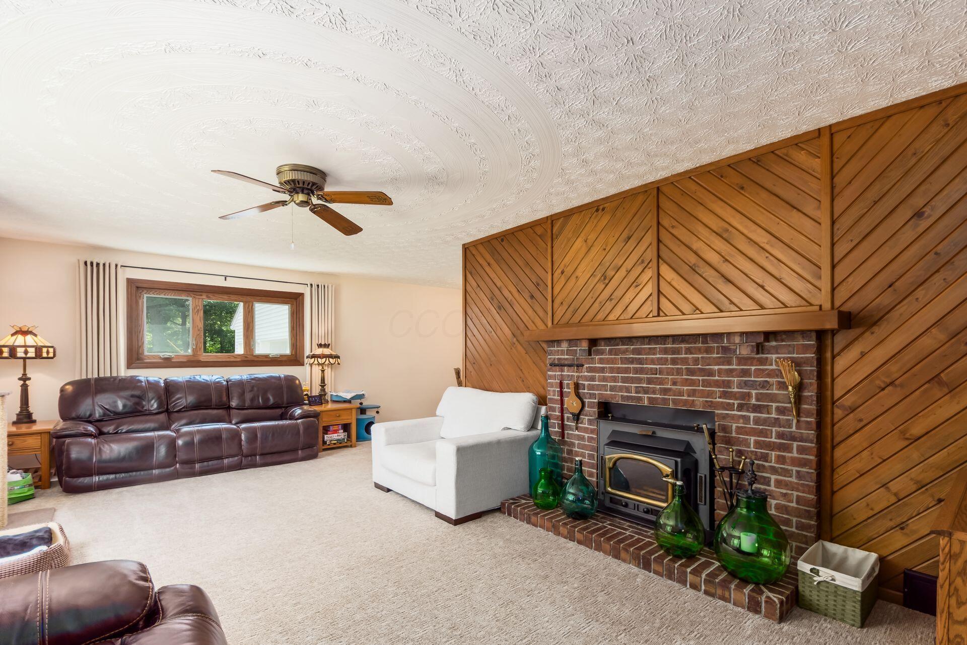 2275 Gardner Road Galloway, OH 43119 - Photo 5 of 38 Family Room with a wood burning fireplace