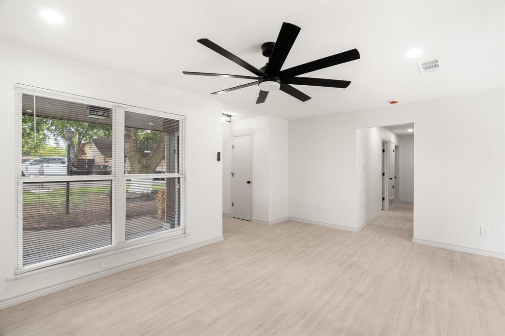 103 North Summit Street Red Oak, TX 75154 - Photo 4 of 26 a view of a livingroom with a ceiling fan