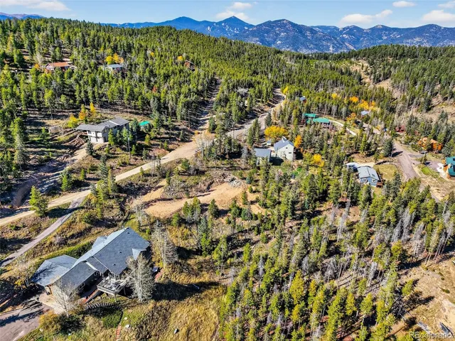 a view of a city with a mountain