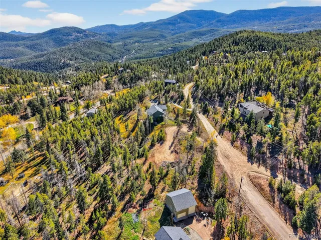 a view of a city with a mountain