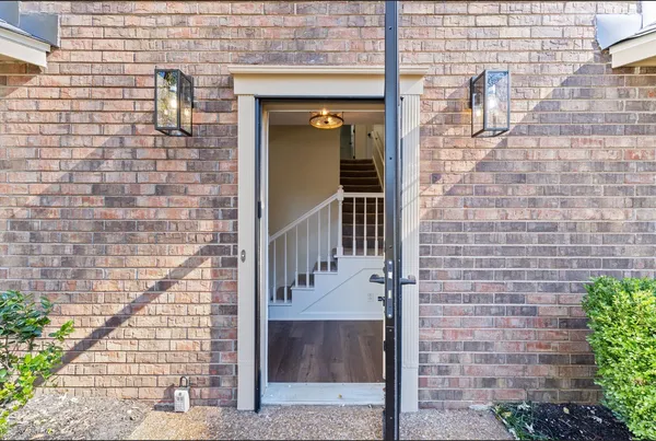 a view of a swimming pool with an outdoor space and seating area