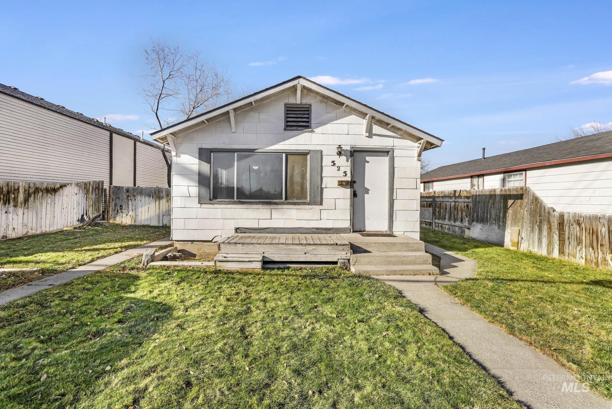 525 Adams Street Twin Falls, ID 83301 - Photo 2 of 31 View of front of house with a fenced backyard