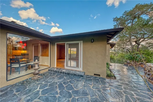 a view of a house with a patio