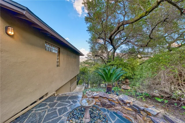 a backyard of a house with seating space