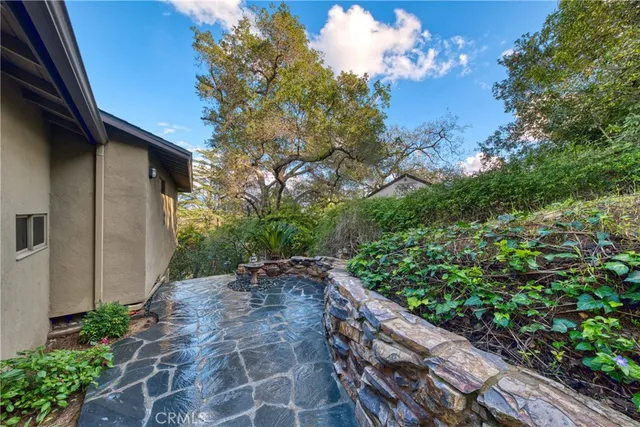 a backyard of a house with lots of green space