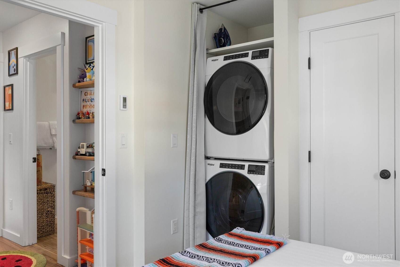 417 East Compass Street Pacific Beach, WA 98571 - Photo 15 of 40 a view of a bedroom with washer and dryer