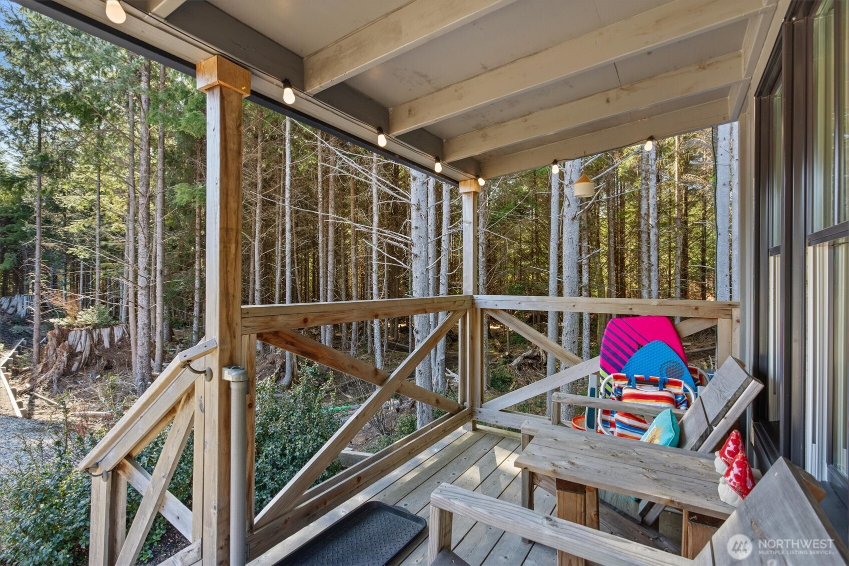 417 East Compass Street Pacific Beach, WA 98571 - Photo 18 of 40 a view of balcony with furniture and garden