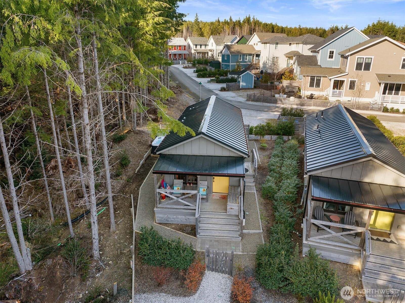 417 East Compass Street Pacific Beach, WA 98571 - Photo 28 of 40 an aerial view of multiple houses with a yard