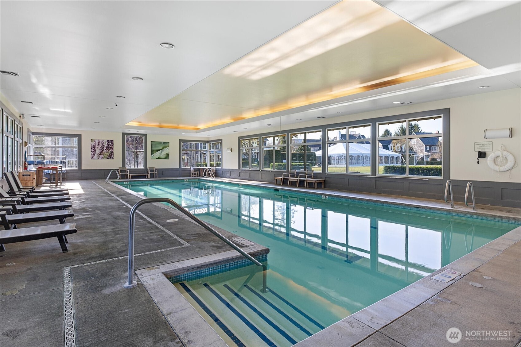 417 East Compass Street Pacific Beach, WA 98571 - Photo 33 of 40 a view of a patio with couches chairs and wooden floor