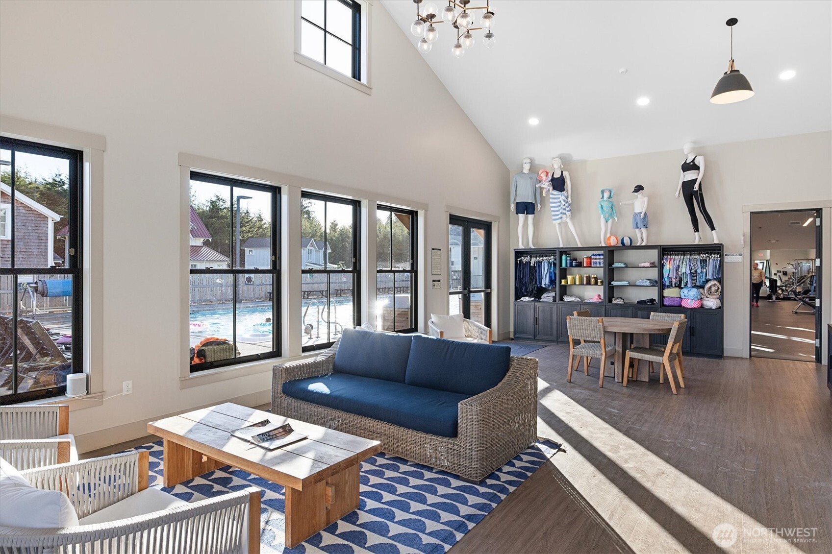 417 East Compass Street Pacific Beach, WA 98571 - Photo 35 of 40 a living room with furniture and a floor to ceiling window