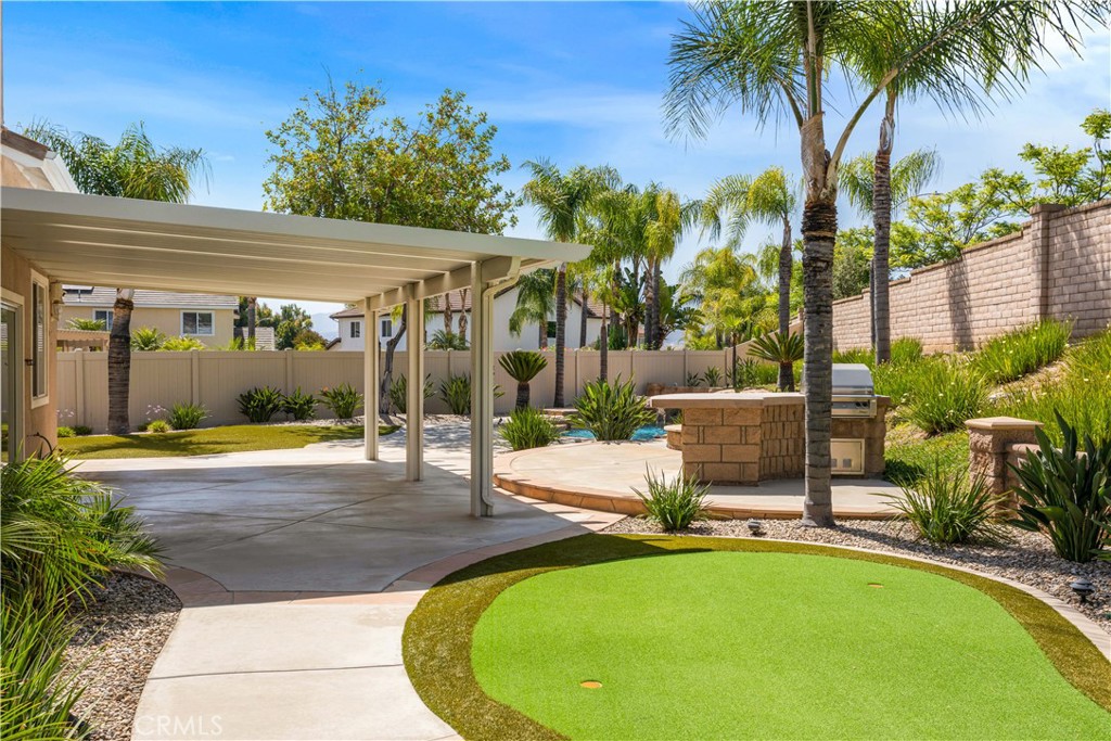 33351 Nicholas Common Temecula, CA 92592 - Photo 30 of 42 a view of a swimming pool with a patio
