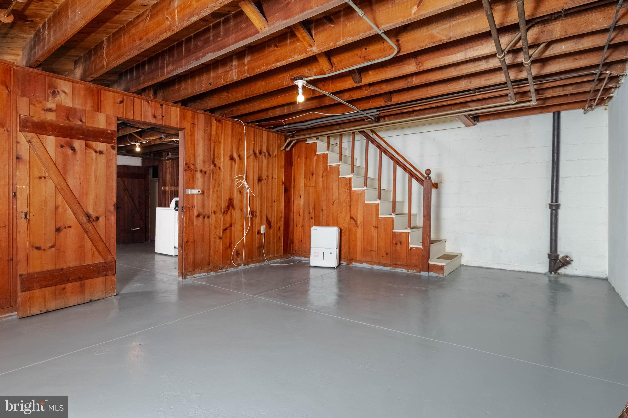 1325 Crofton Road Baltimore, MD 21239 - Photo 16 of 25 a view of an empty room with a window