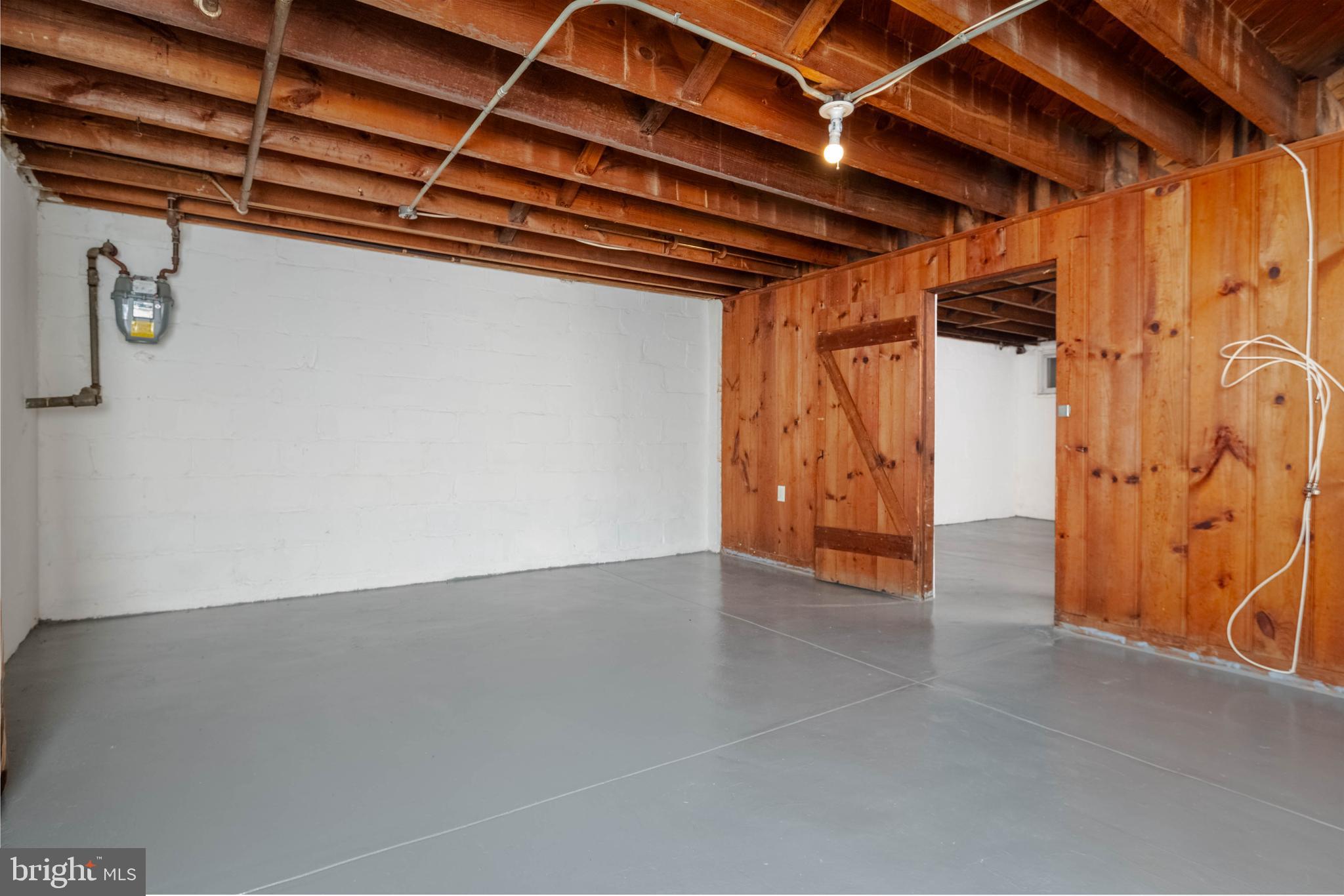 1325 Crofton Road Baltimore, MD 21239 - Photo 17 of 25 a view of a room with wooden walls